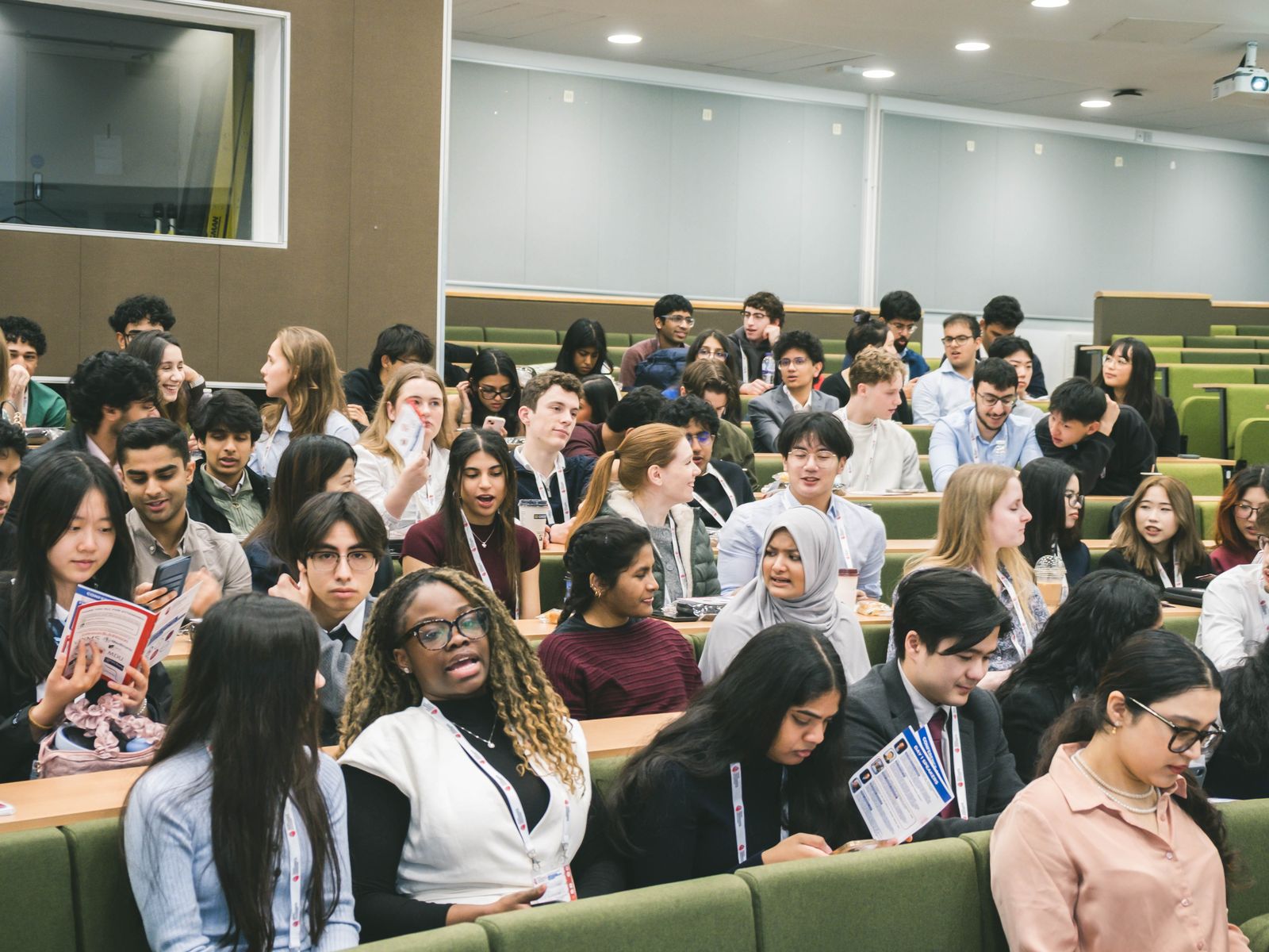 A full lecture theatre at a conference covered by Kyros
